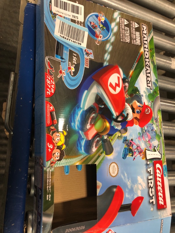 Photo 2 of Carrera First Mario Kart - Slot Car Race Track With Spinners - Includes 2 Cars: Mario and Yoshi - Battery-Powered Beginner Racing Set for Kids Ages 3 Years and Up Mario Kart w/ Spinners