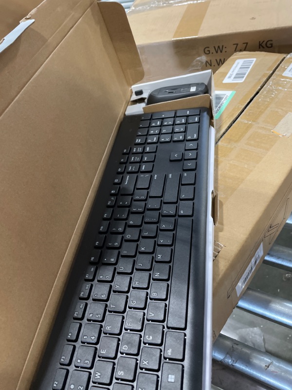 Photo 1 of Dell Wireless Keyboard and Mouse - KM3322W, Wireless - 2.4GHz, Optical LED Sensor, Mechanical Scroll, Anti-Fade Plunger Keys, 6 Multimedia Keys, Tilt Leg - Black