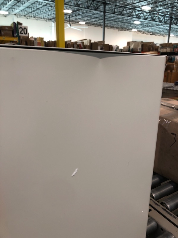 Photo 5 of DEVAISE 3-Drawer Slim Vertical File Cabinet, Fully Assembled Except Casters, Legal/Letter Size, White White 11.8"W x 17.7"D x 23.2"H
***Dented on the side (shown in the last photo)***