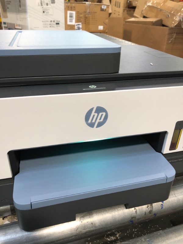 Photo 7 of HP Smart -Tank 7602 Wireless All-in-One Cartridge-free Ink Printer, up to 2 years of ink included, mobile print, scan, copy, fax, auto doc feeder, featuring an app-like magic touch panel (28B98A),Blue
***Toner Spill on the back side, but still functional 