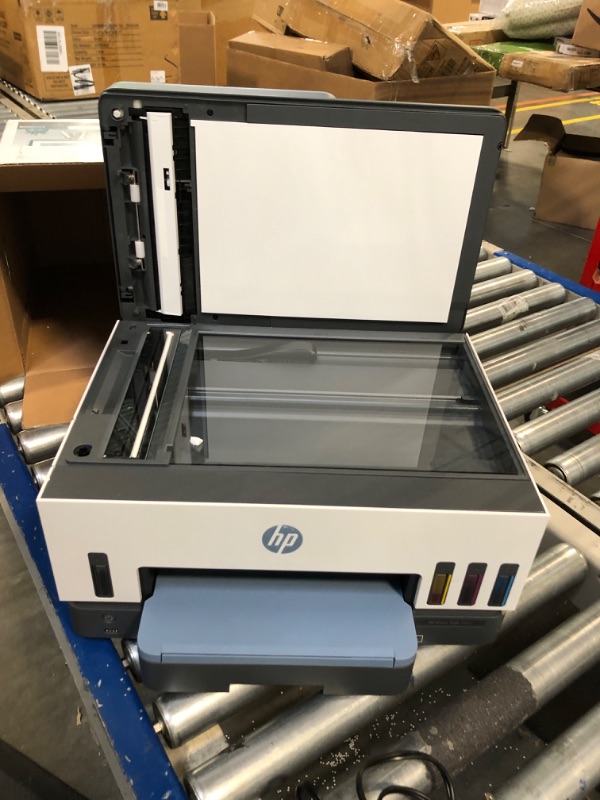 Photo 5 of HP Smart -Tank 7602 Wireless All-in-One Cartridge-free Ink Printer, up to 2 years of ink included, mobile print, scan, copy, fax, auto doc feeder, featuring an app-like magic touch panel (28B98A),Blue
***Toner Spill on the back side, but still functional 