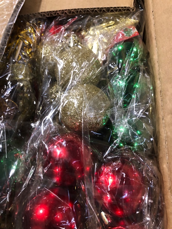 Photo 1 of Wettarn 4 Pcs 24" Prelit Tabletop Mini Christmas Tree Set with LED Light Artificial Small Xmas Tree with Ornaments and Star Treetop, DIY Holiday Christmas Home Decorations