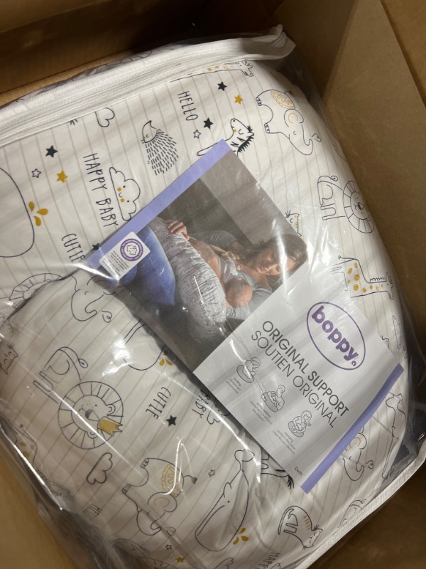 Photo 1 of Boppy Nursing Pillow and Positioner - Original, Notebook Black and White with Gold Animals, Breastfeeding, Bottle Feeding, Baby Support, with Removable Cotton Blend Cover, Awake-Time Support
