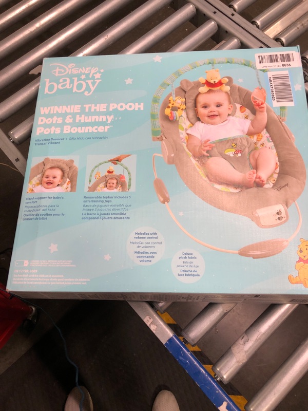 Photo 1 of Bright Starts Winnie the Pooh Dots & Hunny Pots Baby Bouncer with Vibrating Infant Seat, Music & 3 Playtime Toys, 23x19x23 Inch