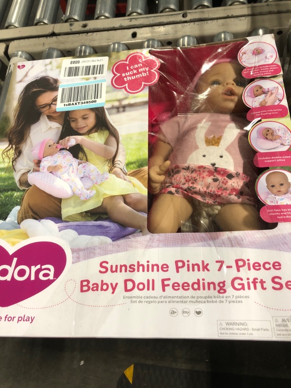 Photo 2 of ADORA Sunshine, 14” Realistic Doll with Feeding Pillow Set with Accessories Including Sun-Printed Onesie, Beanie, Pacifier, Feeding Pillow, Diapers and Milk Bottle for Ages 3 and up Sunshine Baby Doll Set