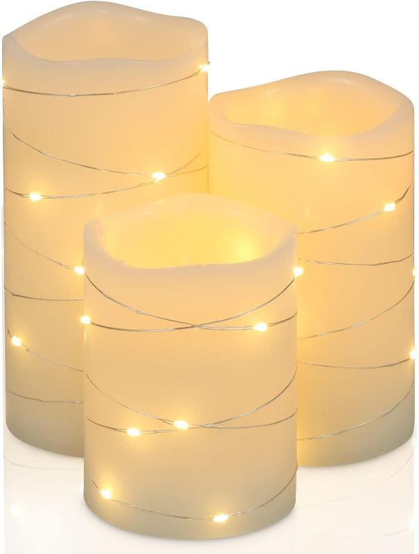 Photo 1 of H-BLOSSOM Flickering Flameless Candles Ivory Real Wax Pillar with Embedded String Lights H-BLOSSOM LED Candles Battery Operated with Cycli