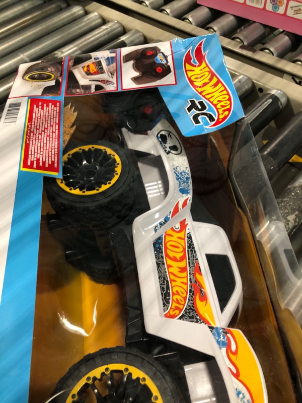 Photo 3 of ?Hot Wheels Remote Control Truck, White Ford RC Vehicle with Full-Function Remote Control, Large Wheels & High-Performance Engine, 2.4 GHz with Range of 65 Feet HW TEAM HW JUMP TRUCK RC