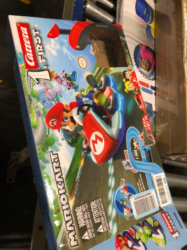 Photo 2 of Carrera First Mario Kart - Slot Car Race Track With Spinners - Includes 2 Cars: Mario and Yoshi - Battery-Powered Beginner Racing Set for Kids Ages 3 Years and Up Mario Kart w/ Spinners