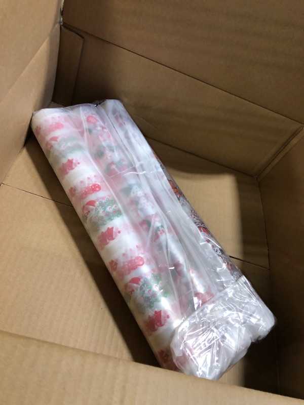 Photo 3 of 3 Pcs Christmas Cellophane Wrap Roll 15.8 Inch x 98.4 Ft, 2.5 Mil Thick Clear Cellophane Gift Wrap Xmas Cellophane Wrap for Gift Baskets Clear Wrapping Paper with Christmas Design for Gift Wrap Decor