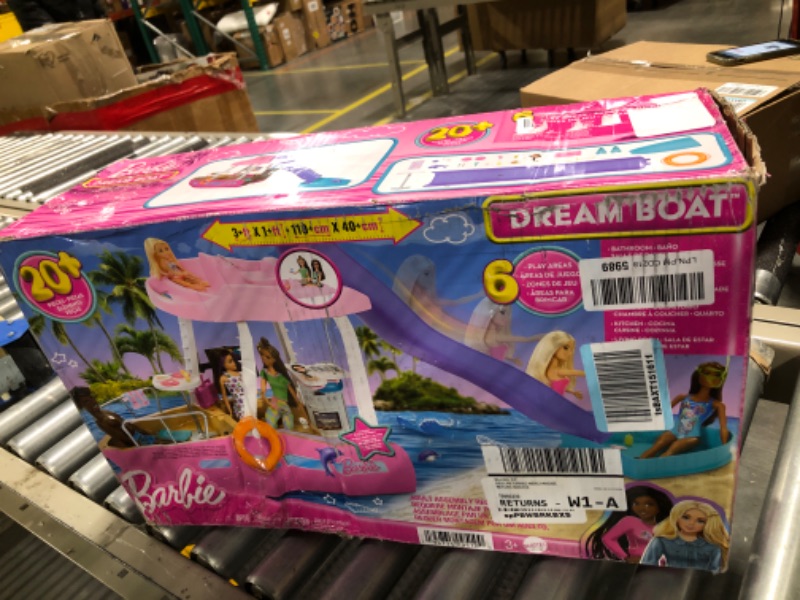 Photo 1 of Barbie Toy Boat Playset, Dream Boat with 20+ Pieces Including Pool, Slide & Dolphin, Ocean-Themed Accessories