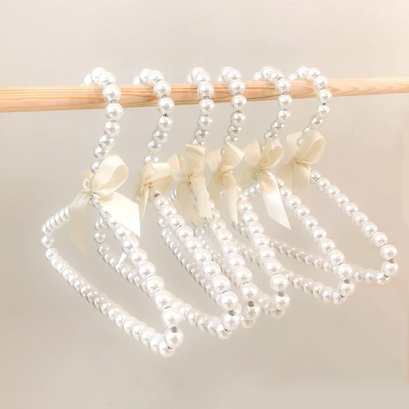 Photo 1 of 6Pack Pet Clothes Hangers Mini Pearl Hangers Pearl Baby Hangers Faux Pearl Beaded Elegant Garment Clothes Hangers with Ribbon Bowknot for Pet Dog Cat Small Baby Kids Children (White)