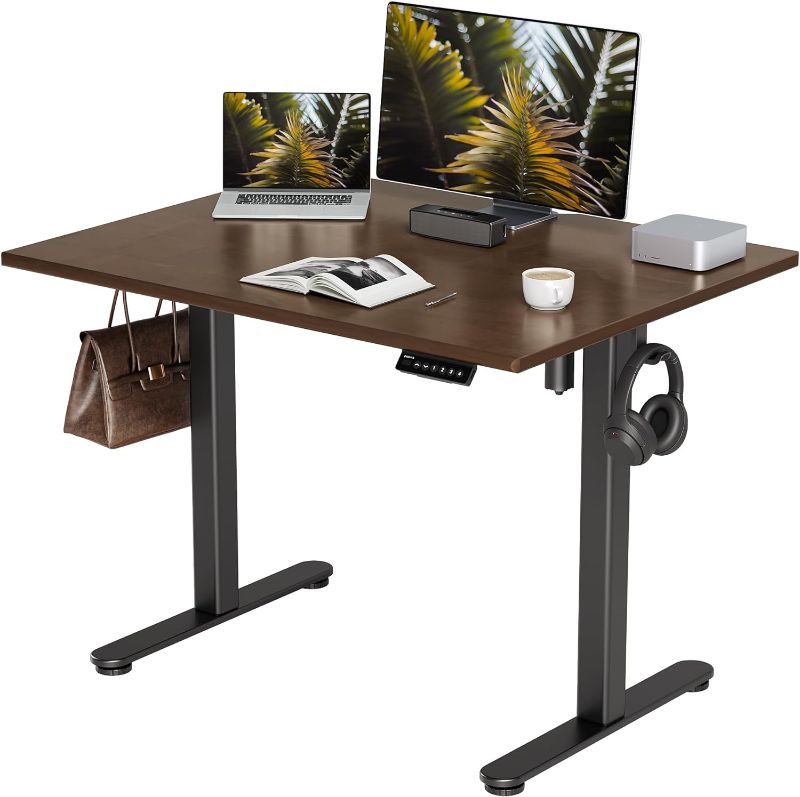 Photo 1 of INNOVAR Solid Wood Electric Standing Desk, 40x24 Inches Adjustable Height Stand up Desk with Whole Piece Desktop, Sit Stand Home Office Desk Black Frame/Espresso Top