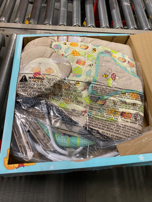 Photo 1 of Bright Starts Disney Baby Winnie the Pooh Baby Bouncer Soothing Vibrations Deluxe Infant Seat - Faux Suede, Music, Removable -Toy Bar, 0-6 Months 6-20 lbs (Dots & Hunny Pots)
