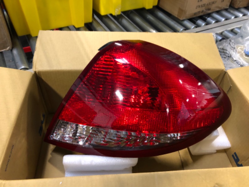 Photo 1 of TYC Left Tail Light Assembly Compatible with 2004-2007 Ford Taurus