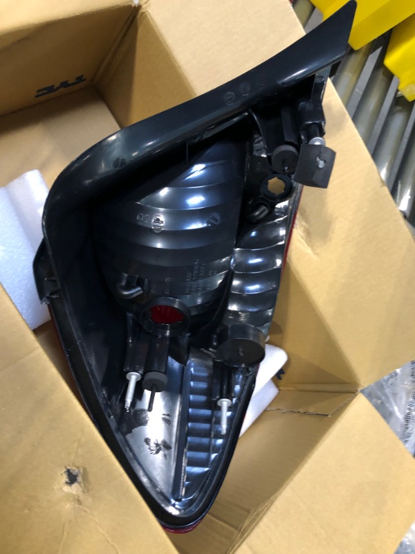 Photo 1 of TYC Left Tail Light Assembly Compatible with 2004-2007 Ford Taurus