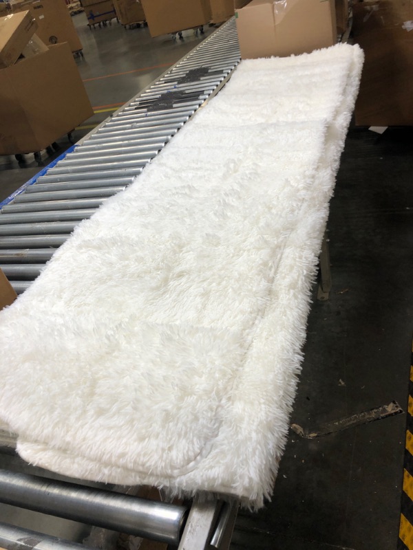 Photo 1 of 84 x 64 inch fuzzy white carpet