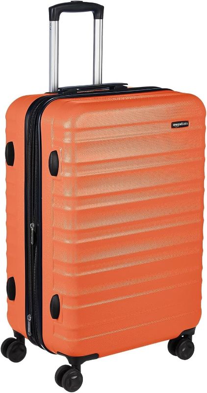 Photo 1 of Amazon Basics 24-Inch Hardside Spinner, Orange