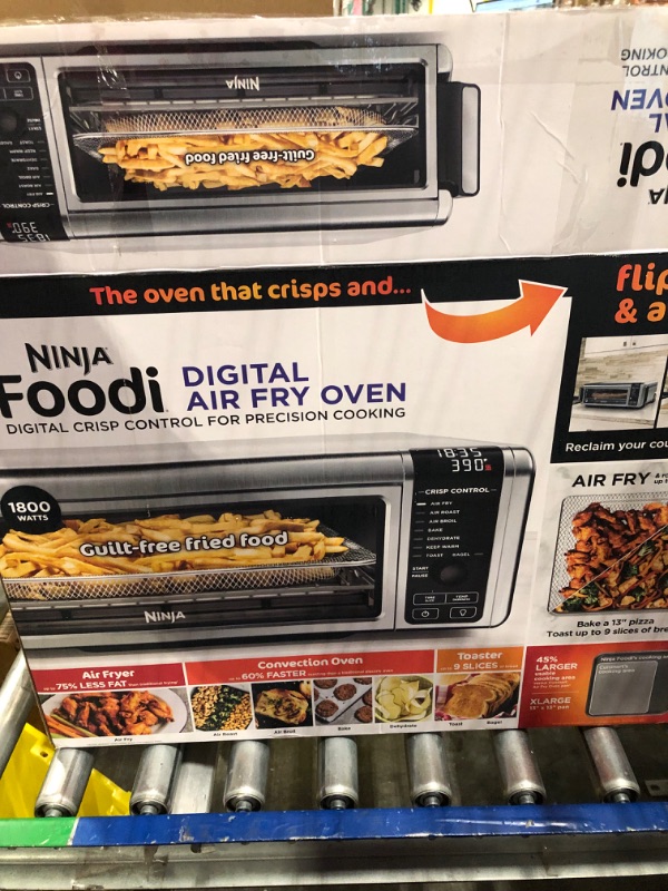 Photo 2 of Ninja SP101 Digital Air Fry Countertop Oven with 8-in-1 Functionality, Flip Up & Away Capability for Storage Space, with Air Fry Basket, Wire Rack & Crumb Tray, Silver 8 Functions Silver & Black