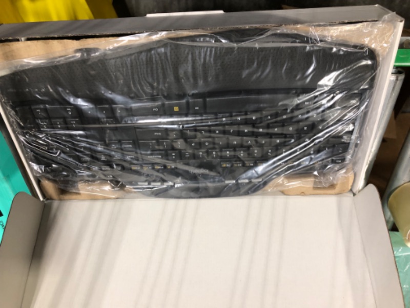 Photo 1 of Logitech MK710 Wireless Keyboard and Mouse Combo — Includes Keyboard and Mouse, Stylish Design, Built-In LCD Status Dashboard, Long Battery Life