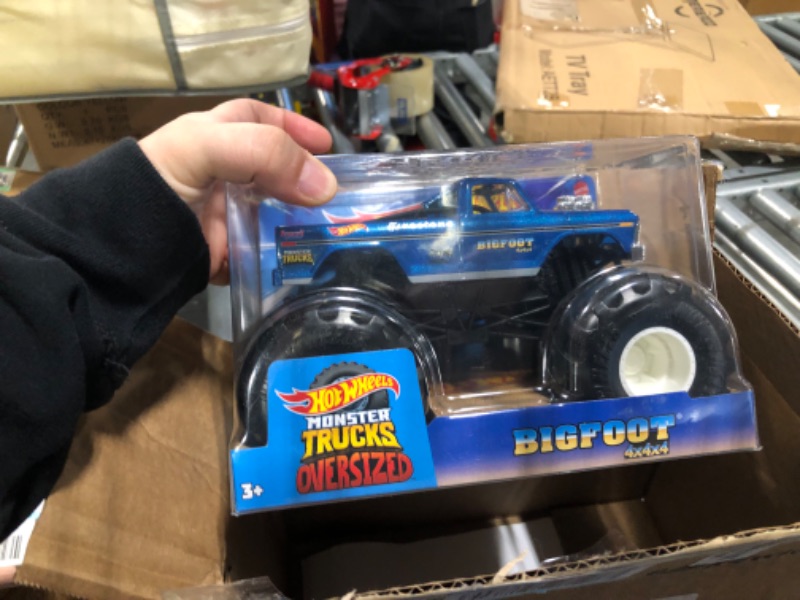 Photo 3 of Hot Wheels Monster Trucks, Oversized Monster Truck Bigfoot, 1:24 Scale Die-Cast Toy Truck with Giant Wheels and Cool Designs