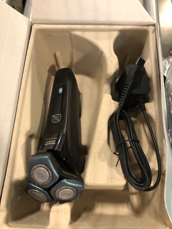 Photo 2 of ***ITEM IS USED***

Philips Norelco Shaver 7500, Rechargeable Wet & Dry Electric Shaver with SenseIQ Technology, Quick Clean Pod, Travel Case and Pop-up Trimmer, S7783/84 Old Version