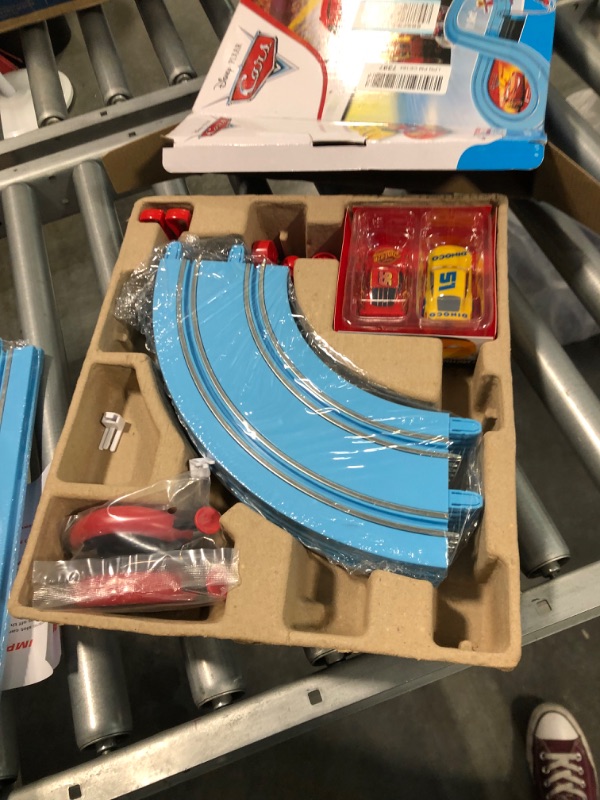 Photo 1 of Carrera First Disney/Pixar Cars - Slot Car Race Track - Includes 2 Cars: Lightning McQueen and Dinoco Cruz - Battery-Powered Beginner Racing Set for Kids Ages 3 Years and Up Disney Cars w/ Spinners