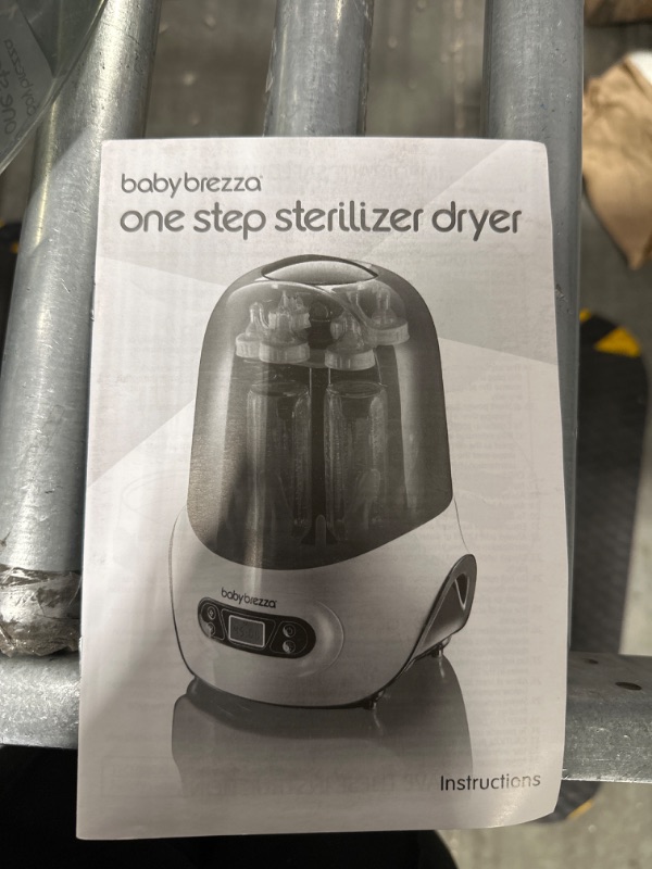 Photo 4 of Baby Brezza Baby Bottle Sterilizer and Dryer Machine – Electric Steam Sterilization - Universal Fit - Pacifiers, Glass, Plastic, and Newborn Feeding Bottles

*SLIGHT WEAR AND TEAR*