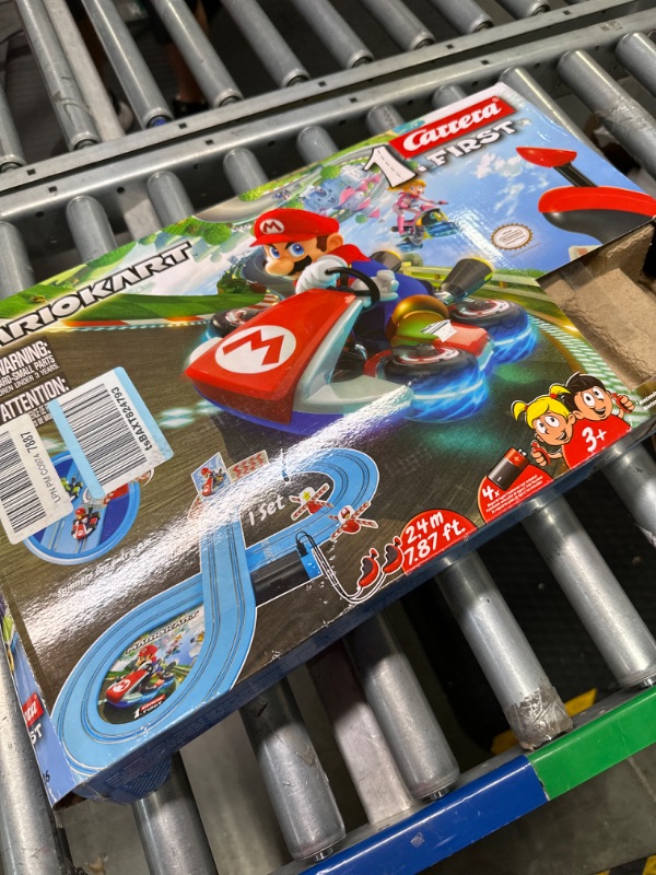 Photo 2 of Carrera First Mario Kart - Slot Car Race Track With Spinners - Includes 2 Cars: Mario and Yoshi - Battery-Powered Beginner Racing Set for Kids Ages 3 Years and Up Mario Kart w/ Spinners