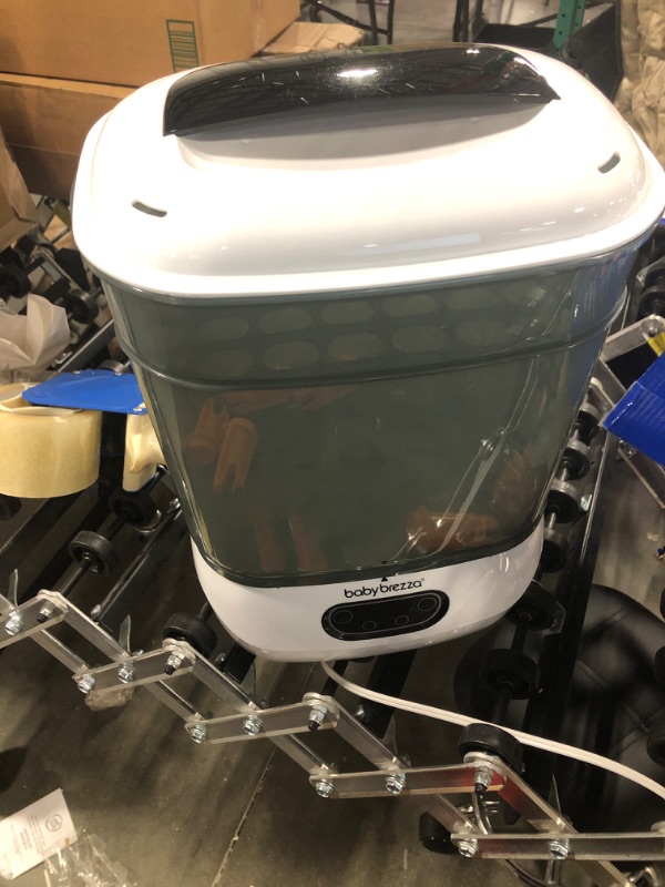 Photo 1 of Baby Brezza Baby Bottle Sterilizer and Dryer Advanced – Electric Steam Sterilization Machine – Universal Sterilizing for All Bottles: Plastic + Glass + Pacifiers + Breast Pump Parts - HEPA Filtration  ( WASH BEFORE USE ) 