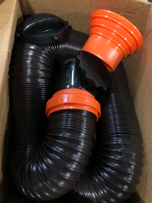 Photo 3 of Camco RhinoFLEX RV Sewer Hose Kit with Swivel Transparent Elbow and 4-in-1 Dump Station Fitting, Brown, 15 Feet (39770) 15ft Sewer Hose Kit Frustration-Free Packaging