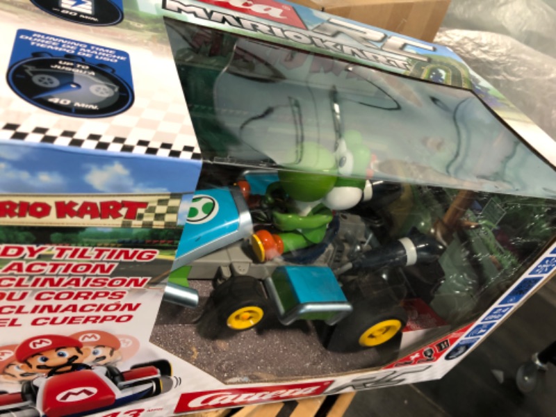 Photo 2 of Carrera RC 370162108X Official Licensed Mario Kart Yoshi Race Kart 1:16 Scale 2.4 GHz Splash Proof Remote Control Car Vehicle with Sound and Body Tilting Action - Rechargeable Battery - Kid Toys Mario Kart Race Kart - Yoshi