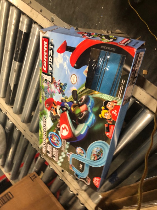 Photo 4 of Carrera First Nintendo Mario Kart Slot Car Race Track - Includes 2 Cars: Mario and Luigi and Two-Controllers - Battery-Powered Beginner Set for Kids Ages 3 Years and Up, 20063028 Mario Kart / Flippers