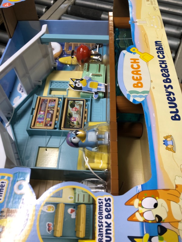 Photo 4 of BLUEY Beach Cabin Playset, with Exclusive Figure with Goggles. Includes 10 Play Pieces and Sticker Sheet