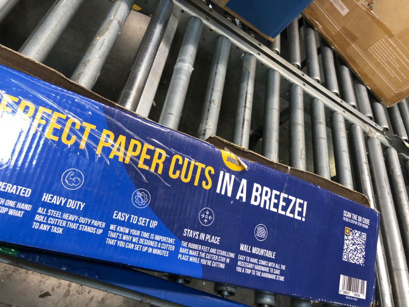 Photo 1 of Paper Roll Dispenser and Cutter - Heavy Duty Kraft, Freezer, and Butcher Paper Dispenser - Non Slip Paper Cutter for 18 Inches Rolls - Wall Mountable, Flat Blade 18"