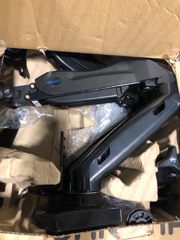 Photo 1 of HUANUO Dual Monitor Stand - Adjustable Spring Monitor Desk Mount Swivel Vesa Bracket with C Clamp