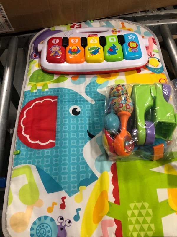 Photo 1 of Fisher-Price Baby Gym with Kick & Play Piano Learning Toy featuring Smart Stages Educational Content and 2 Soft Maracas Rattle Toys Kick 'n Play Gym & Maracas