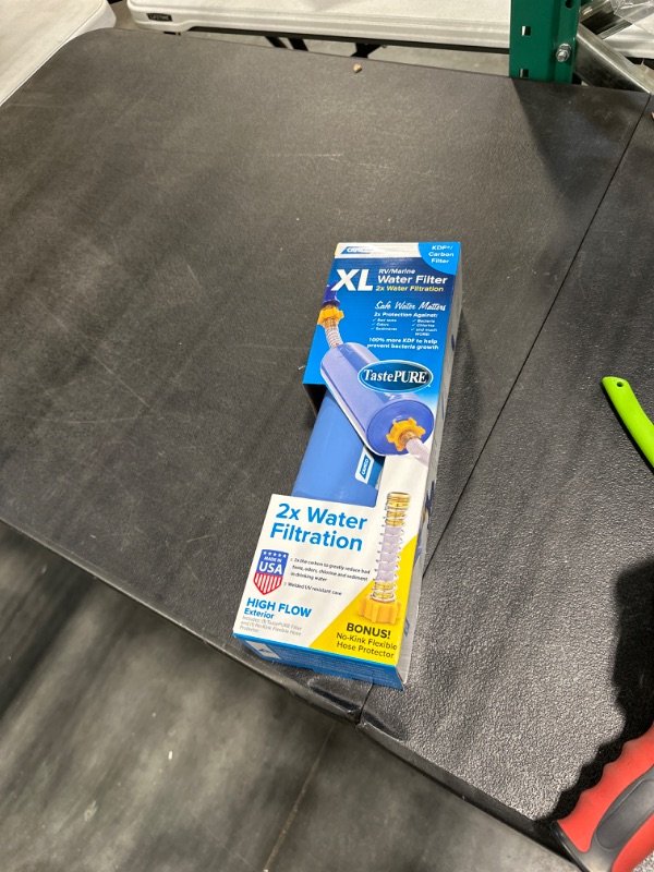 Photo 1 of Camco TastePURE XL Camper/RV Water Filter & Hose Protector | Inline Water Filter Reduces Bad Taste, Odor, Chlorine & More | Ideal for RVs, Campers, Travel Trailers, Boats | Made in the USA | (40019)