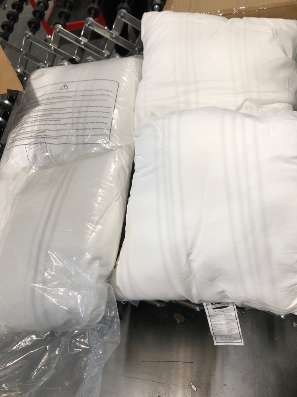 Photo 1 of 4 small white pillows 