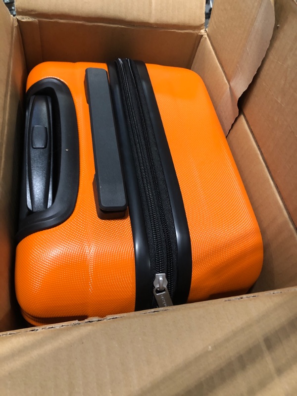 Photo 1 of Amazon Basics 21-Inch Hardside Spinner, Orange Orange 21-inch Spinner
