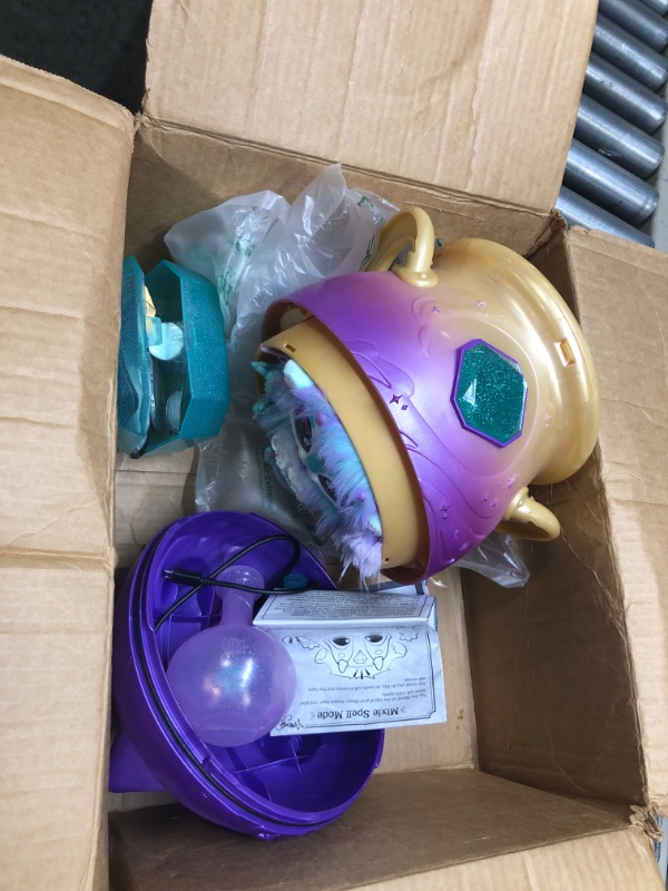 Photo 1 of Magic Mixies Magical Misting Cauldron with Interactive 8 inch Blue Plush Toy and 50+ Sounds and Reactions, Multicolor
