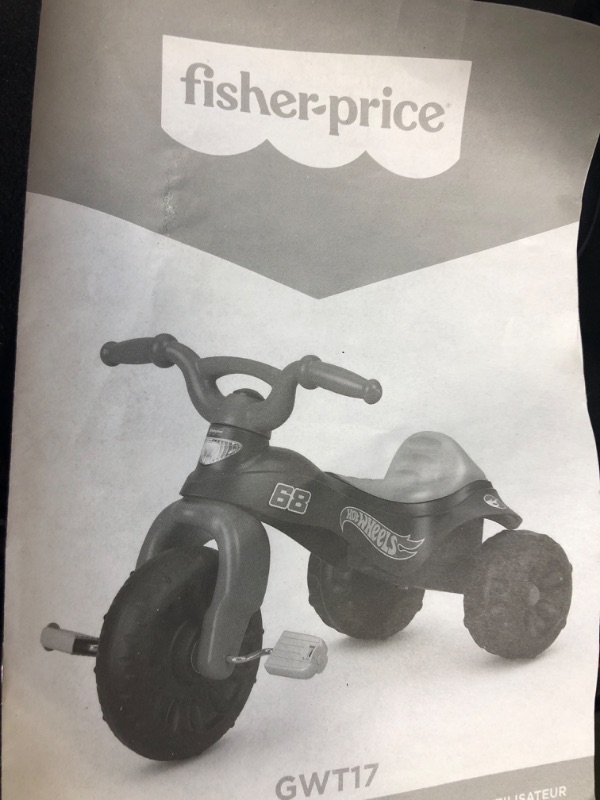 Photo 2 of Fisher-Price Harley-Davidson Tricycle with Handlebar Grips and Storage Area, Multi-Terrain Tires, Tough Trike [Amazon Exclusive]