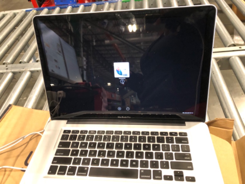 Photo 7 of **NOT FUNCTIONAL** **SOLD FOR PARTS ONLY** Apple MacBook Pro MC721LL/A 15.4-Inch Laptop (500 GB HDD, 2 GHz i7 Quad Core Processor, 4 GB SDRAM) (Refurbished)