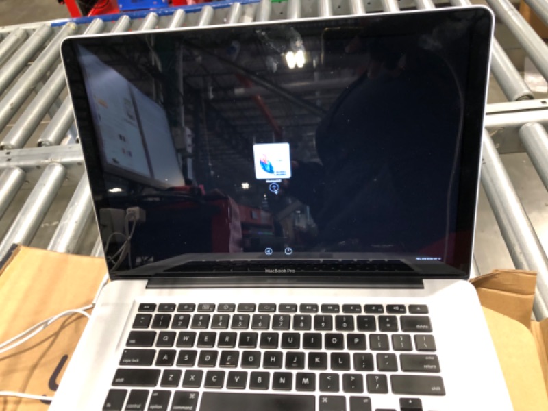 Photo 3 of **NOT FUNCTIONAL** **SOLD FOR PARTS ONLY** Apple MacBook Pro MC721LL/A 15.4-Inch Laptop (500 GB HDD, 2 GHz i7 Quad Core Processor, 4 GB SDRAM) (Refurbished)