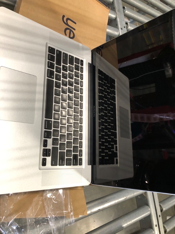 Photo 5 of **NOT FUNCTIONAL** **SOLD FOR PARTS ONLY** Apple MacBook Pro MC721LL/A 15.4-Inch Laptop (500 GB HDD, 2 GHz i7 Quad Core Processor, 4 GB SDRAM) (Refurbished)