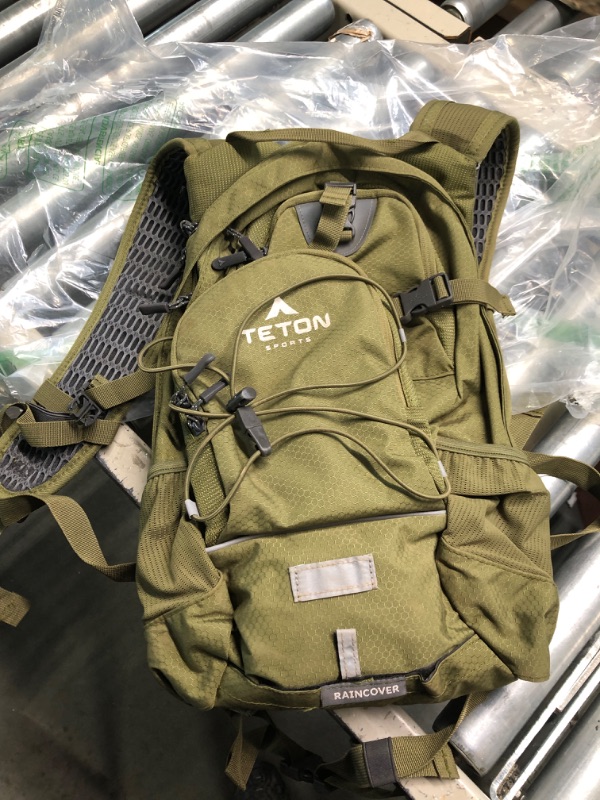 Photo 1 of teton sports raincover green backpack