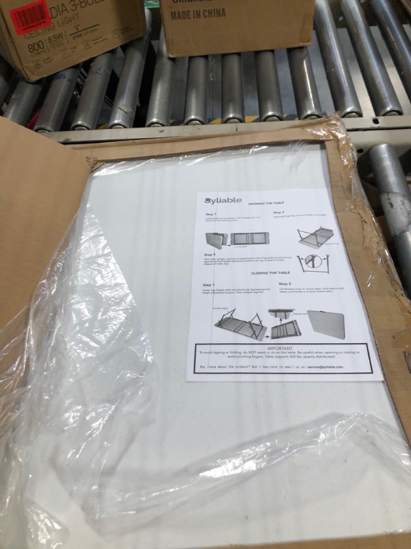 Photo 1 of BYLABLE folding table white 