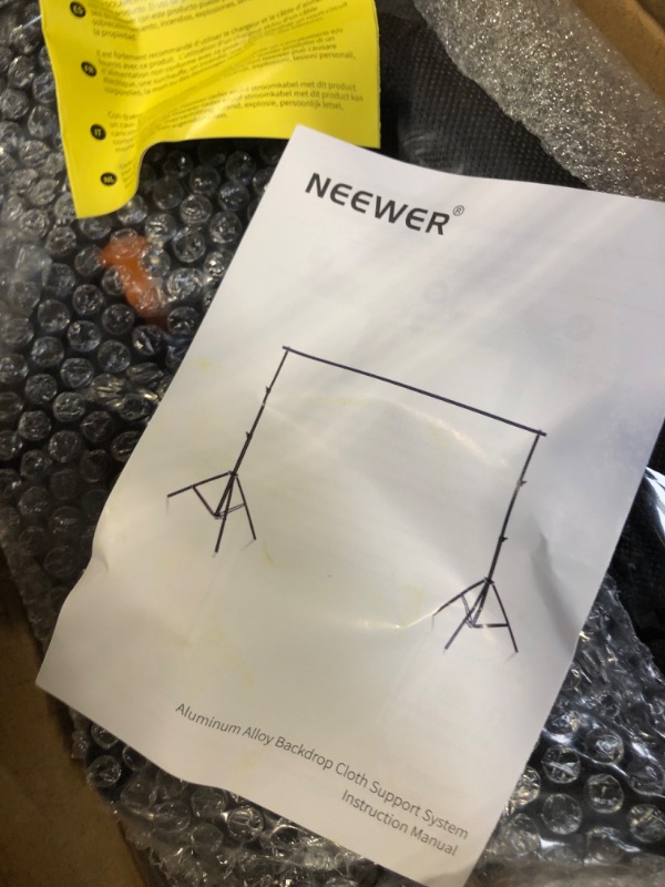 Photo 1 of Neewer Photo Studio Backdrop Support System, 10ft/3m Wide 6.6ft/2m High Adjustable Background Stand with 4 Crossbars, 6 Backdrop Clamps, 2 Sandbags, and Carrying Bag for Portrait & Studio Photography Black