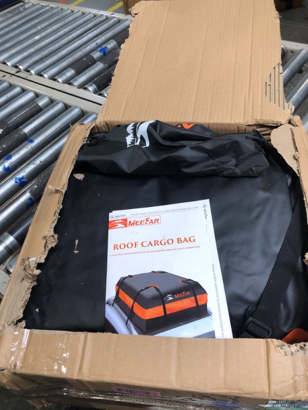 Photo 1 of APTY 21 Cubic Feet Car Rooftop Cargo Bag Carrier, Soft Roof Top Luggage Bag for All Vechicles with/Without Racks - with Waterproof Zip, Luggage Lock, Anti-Slip Mat, Storage Bag, Door Hooks 21" Orange - with Lock