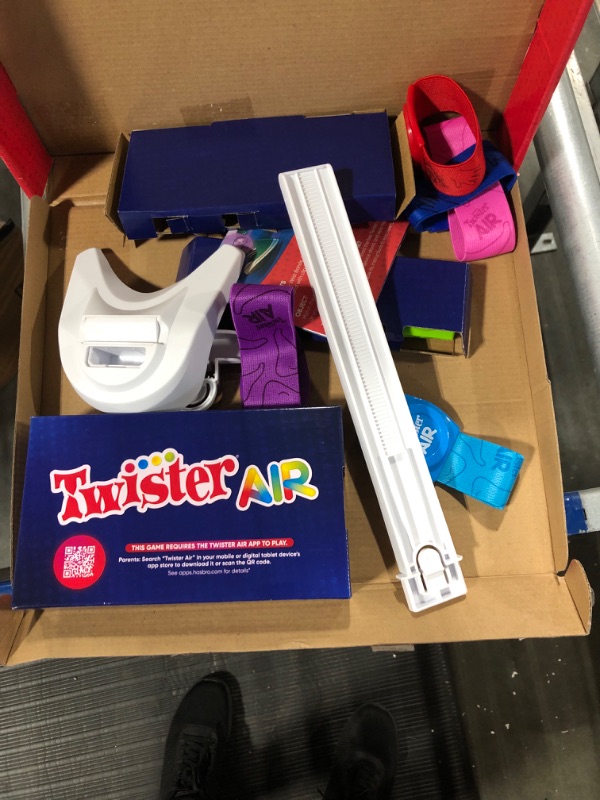 Photo 2 of Hasbro Gaming Twister Air Game | AR App Play Game with Wrist and Ankle Bands | Links to Smart Devices | Active Party Games for Kids and Adults | Ages 8+ | for 1+ Players