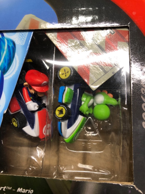 Photo 3 of Carrera First Mario Kart - Slot Car Race Track With Spinners - Includes 2 Cars: Mario and Yoshi - Battery-Powered Beginner Racing Set for Kids Ages 3 Years and Up Mario Kart w/ Spinners